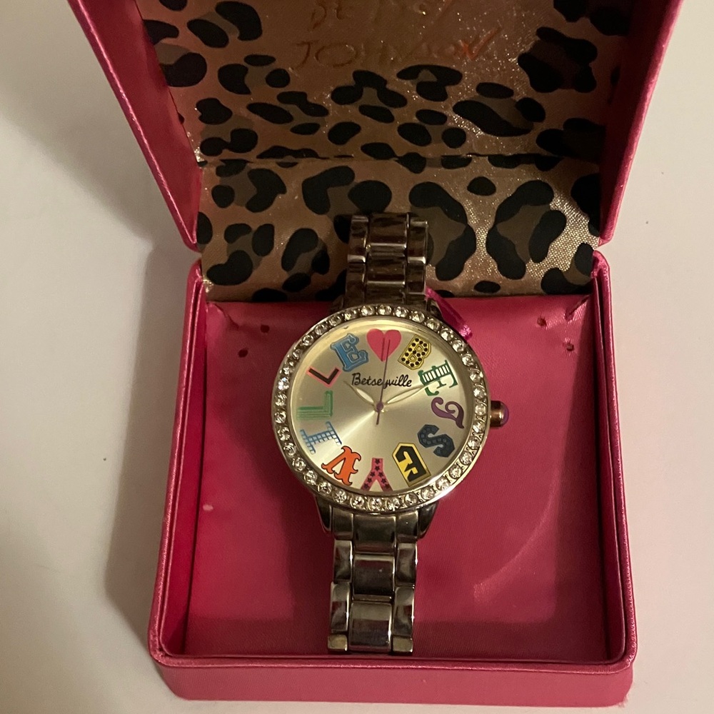 Betsey Johnson Watch with colorful face.
